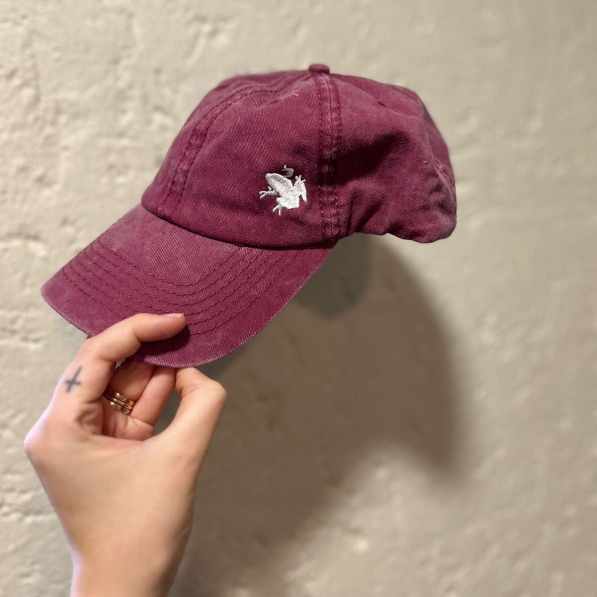 Plum cap